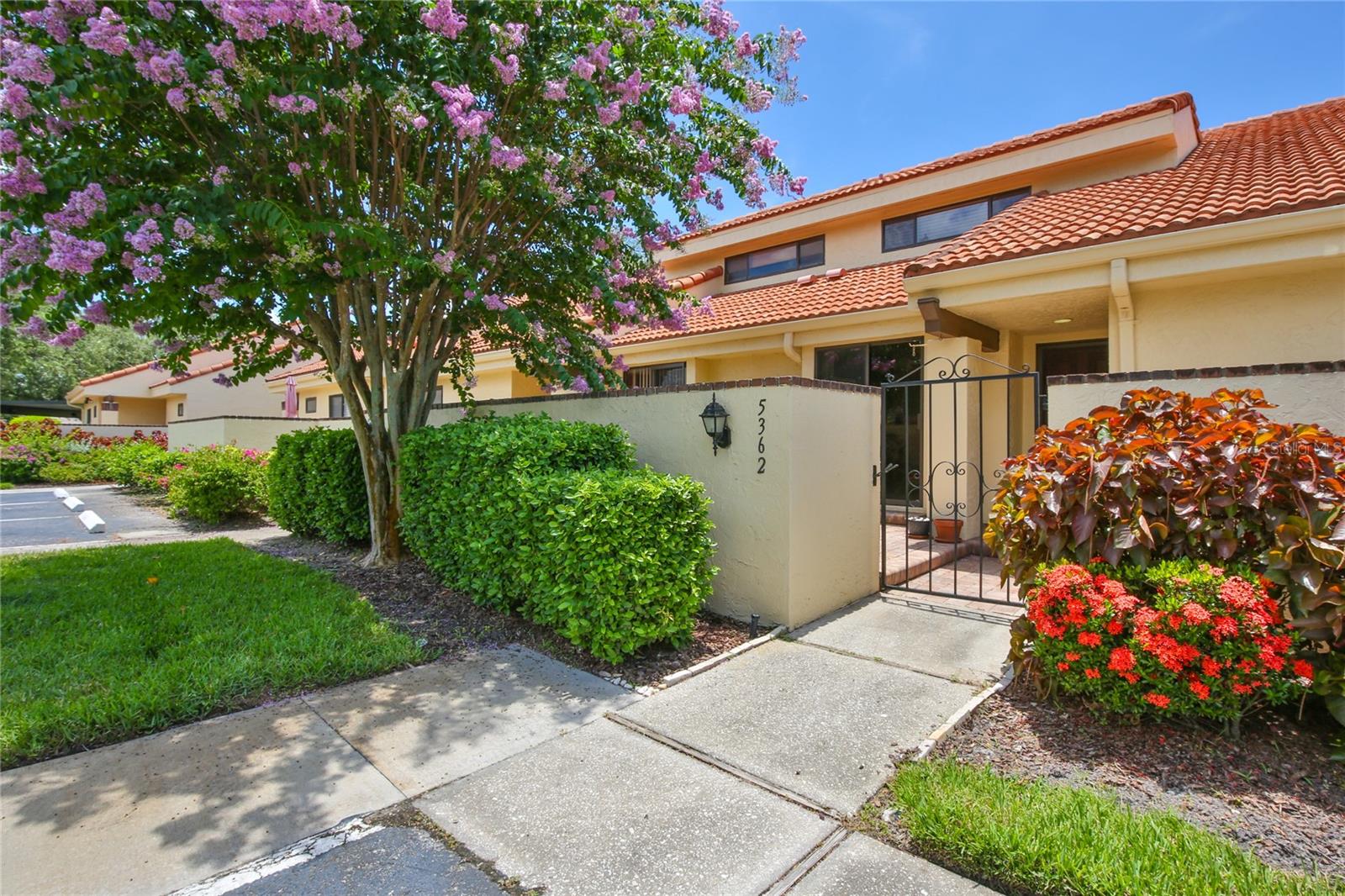 New Price! Huntingwood sits within one of Sarasota’s most sought-after communities, The Meadows. A fantastic find, this three-bedroom townhome is ready for its new owner. Lives like a home, with the convenience of condo living, and perfectly located near UTC, Benderson Park which hosts Worldclass events, and I-75. Easily access Downtown Sarasota, the arts, and cultural offerings, along with our beautiful Gulf Beaches. The floorplan works well with your Primary Suite on the main level, along with laundry room, spacious bathroom with walk in shower, dual sinks, and tons of closet space. Upstairs includes two guest rooms, great closet space, extra storage, and large bathroom with tub/shower and spacious vanity. Your kitchen is light filled, set up with all conveniences including built in buffet for extra storage, and even has sliding glass doors so you can enjoy your private front patio for outdoor dining. The open floor plan includes formal dining with step down to spacious living room lined with sliding glass doors to enjoy your view of garden and pool. French door allows access to the covered and screened lanai, which you can also access from the primary suite through sliding glass doors - beautifully private and peaceful! Covered parking included for you, with additional storage closet attached. With a resort feel, The Meadows provides fantastic amenities. Enjoy heated pools, maintenance-free living, and membership to the Renaissance Fitness Club which is recently renovated and even offers wellness programs. Additionally, there are 14 miles of walking and biking trails throughout the lush landscaping and beautiful setting, which is rare to find just outside your door. If desired, you can also add membership for golf and/or tennis. Schedule your showing today.