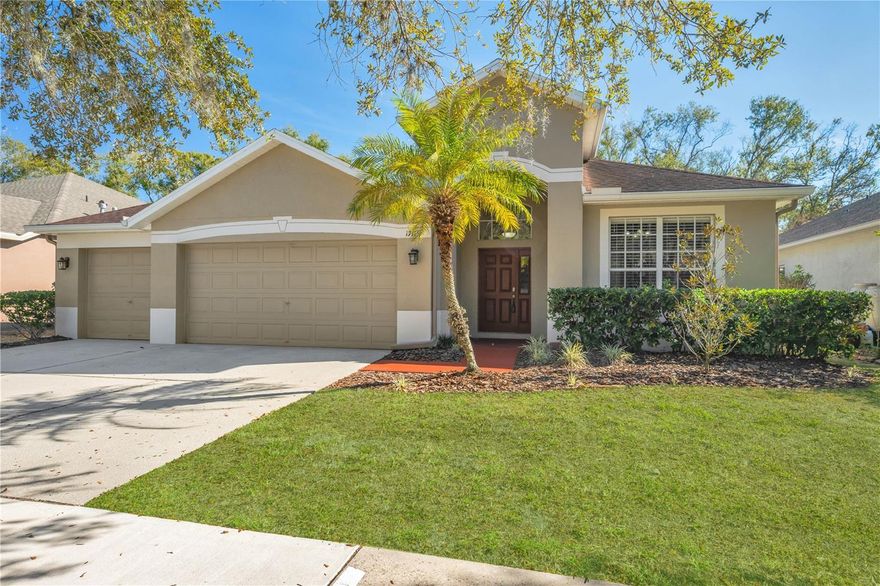 Welcome home to the highly sought-after FishHawk Ranch community, where comfort, space, and resort-style living meet in a home that has been lovingly cared for and meticulously maintained. This inviting 4-bedroom, 2-bath residence with a 3-car garage showcases pride of ownership throughout, offering an open, airy feel with vaulted ceilings and a thoughtfully designed layout ideal for both everyday living and entertaining.

Inside, you’ll find a formal dining room, a spacious living room, and a warm, welcoming eat-in kitchen featuring stainless steel appliances—perfectly maintained and ready for gatherings large or small. The private primary suite is a true retreat, complete with a generous walk-in closet and a spa-inspired en-suite bath with dual sinks on a large vanity, a separate soaking tub and shower, and an enclosed water closet. Secondary bedrooms are generously sized and flexible for family, guests, or a home office.  The current owners were drawn to this home specifically for the oversized 3-car garage, thoughtfully designed to comfortably accommodate a full-size pickup truck—an uncommon and highly desirable feature.

Step outside to the covered and screened patio, overlooking a private, fenced backyard—an ideal setting for peaceful evenings or weekend get-togethers. The home has been continuously upgraded with care, including new carpet (2024), gutters and exterior paint (2022), an upgraded HVAC system (2021), vinyl fencing (2021), guest bathroom updates sink, faucets and shower fixture (2022), owner’s bathroom upgrades installed chair level toilet plus safety bars(2021), impact-resistant sliding door (2020), extended and screened lanai (2019), a yard drainage system (2019).  The new owners will truly appreciate the Kinetico water system (upgraded 2025) providing long-term benefits throughout the home.

Located within a top-rated Hillsborough County school district and just minutes from dining, shopping, and the community sports complex, this home offers both convenience and peace of mind. Residents of FishHawk Ranch enjoy a low HOA with exceptional amenities, including a clubhouse, resort-style pool, playgrounds, scenic nature trails, tennis courts, soccer field, and basketball court.

This is a rare opportunity to own a truly cared-for home in one of the area’s most desirable communities. Schedule your private showing today and experience the difference of a home that has been lovingly maintained.