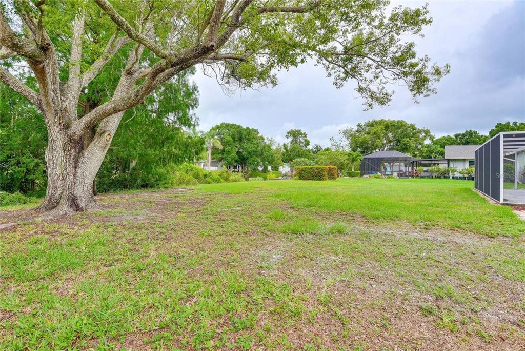 Photo of 4831 Greenleaf Road, Sarasota, FL 34233 (MLS # A4664450)