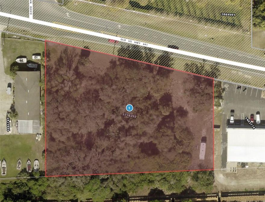 Light Manufacturing Vacant Parcel located near the intersection of Old 441 and David Walker Road and in the jurisdiction of Lake County. This property previously was approved for four (4) 80' by 20' buildings.