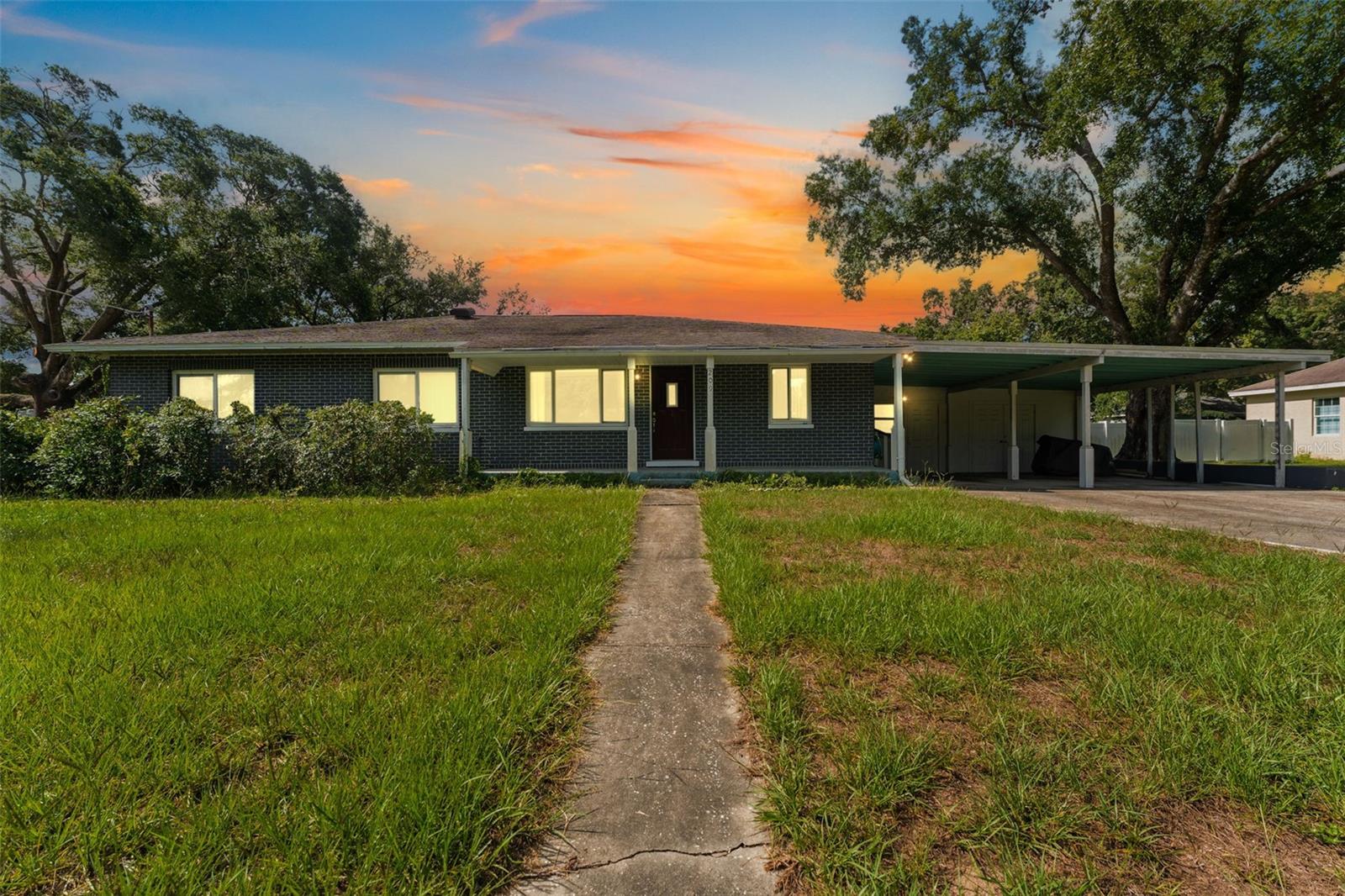 This one-of-a-kind property is perfect as a starter home or investment opportunity. Situated on nearly half an acre (.43 acres), the main home features 3 spacious bedrooms and 2 full bathrooms, offering comfortable living space with room to grow. What truly sets this home apart is the bonus 4th room, complete with separate entrance and plumbing already in place for a kitchen and bathroom. Whether you’re looking to create a custom in-law suite, private guest space, or income-generating ADU, the possibilities are wide open. Live in the main home and rent out the additional space, host visiting family and friends, or even explore room-by-room rental options—this property offers flexibility to suit your lifestyle or investment strategy. Located just minutes from downtown Tampa, Tampa International Airport, shopping, dining, entertainment, and more, convenience is at your doorstep. Best of all, there are NO HOA fees and NO CDD taxes—just freedom and opportunity.