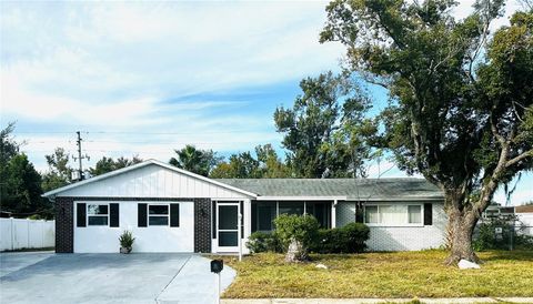 Photo of 7721 Heather Street, New Port Richey, FL 34653 (MLS # TB8449893)