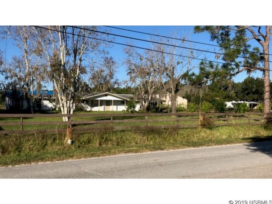 Amazing Estate Property Impeccably maintained  situated on 6.5 beautiful acres. Main roof of home scheduled to be replaced ASAP. Gated entry, two car garage and covered carport. Huge Barn plus huge Pole Barn. Two pastures. Endless possibilities! Come take a look today!