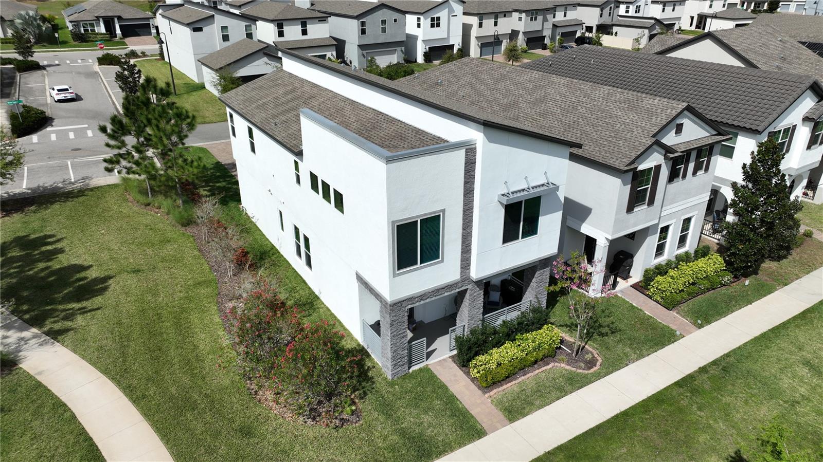 Welcome to 2035 White Feather Loop, a stunning haven nestled in the serene community of Oakland Trails. This meticulously crafted residence offers an unparalleled blend of modern elegance and timeless charm, providing a sanctuary for luxurious living. Upon arrival, you'll be captivated by the impeccable curb appeal of this home, showcasing lush landscaping and a grand entrance. Step inside to discover an open-concept floor plan flooded with natural light, accentuating the spaciousness and sophistication of each room. The heart of the home lies in the gourmet kitchen, boasting top-of-the-line appliances, upgraded cabinetry, and an expansive island perfect for culinary adventures and entertaining guests. Retreat to the luxurious primary suite, where tranquility awaits. Pamper yourself in the spa-like ensuite with dual vanities, and a walk-in shower. Conveniently located in Oakland, residents enjoy easy access to nearby parks, shopping, dining. Experience the epitome of Florida living at 2035 White Feather Loop