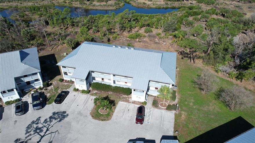 This beautifully updated unit is fully furnished-furnishings not included but negotiable. Located at the back of Fiddlers Green Phase II and backed up to a preserve with peaceful views and sounds of nature. This unit is considered a ground floor unit but is elevated w/3 steps to the front balcony/entrance to the unit.          Phase II of Fiddlers Green has its own clubhouse, pool and tennis courts. The front of the unit faces East Southeast which offers sunsets at the rear. Fiddlers Green is close to Boca Grande along with plenty of shopping, golfing, nature parks and beaches. There is a Hair Salon/Spa and restaurant located at the front entrance to Fiddlers Green (Not Associated w/Fiddlers Green - Independently Owned). If you are looking for affordable, convenienty and easy living then welcome to Fiddlers Green ! ! !