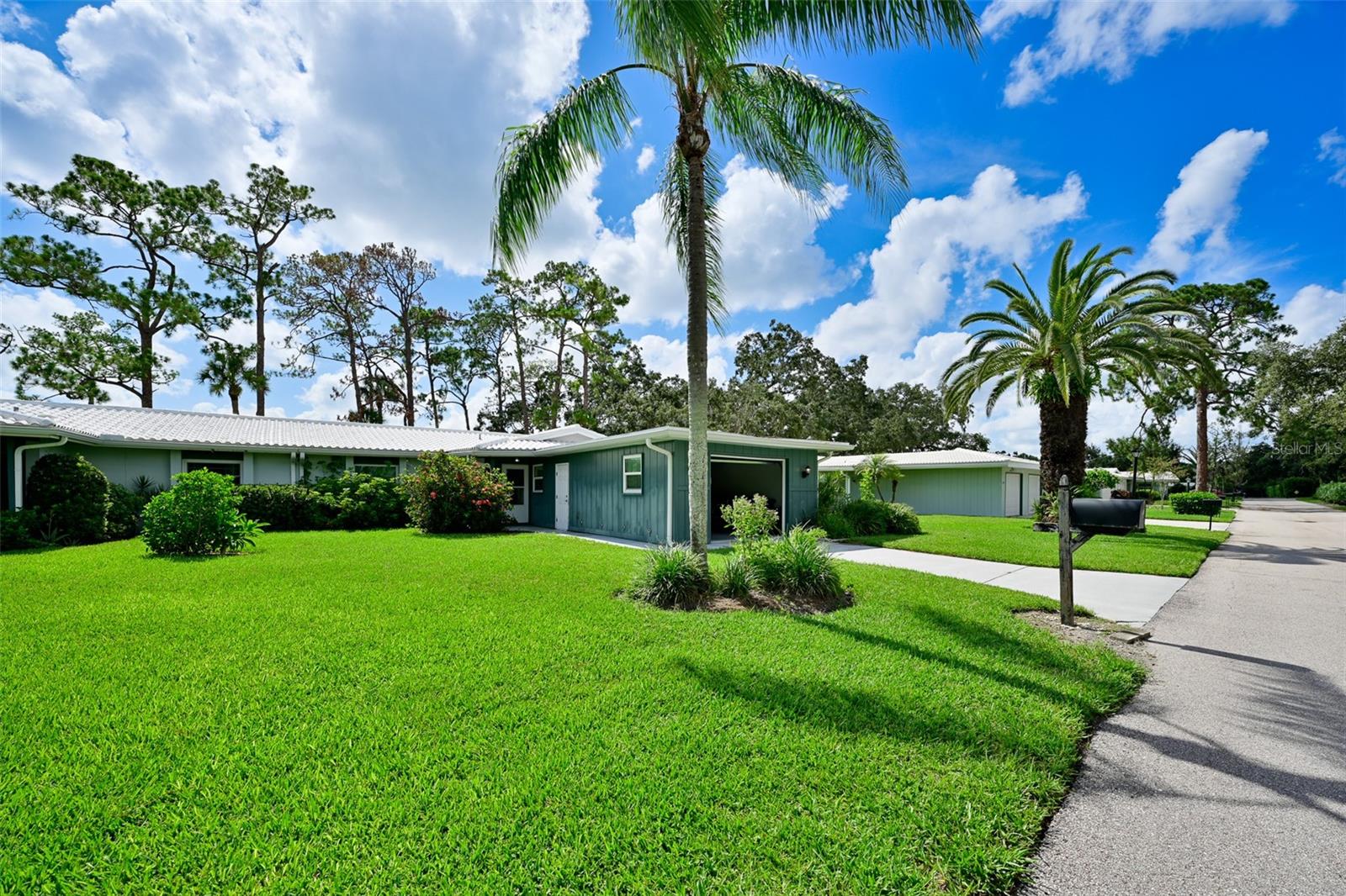 Welcome to your turnkey Villa in the vibrant Village Green at Forest Lakes! Completely remodeled in 2016, this spacious 1,456 sq ft, single-level residence offers 2 bedrooms, 2 baths, and plenty of charm. The primary suite includes a versatile windowed sitting room perfect for relaxing or remote work.
Surrounded by lush landscaping and located just steps from the community pool, this residence offers maintenance-free living in a warm, ACTIVE 55+ neighborhood. Ideal for full-time or seasonal living, it’s close to Sarasota’s downtown cultural scene, casual dining, shopping, Pinecraft Village, Legacy Bike Trail, and Siesta Key Beach.
With an oversized attached garage, modern finishes, and an inviting layout, this villa exudes comfort and convenience. This cozy villa is waiting for you!