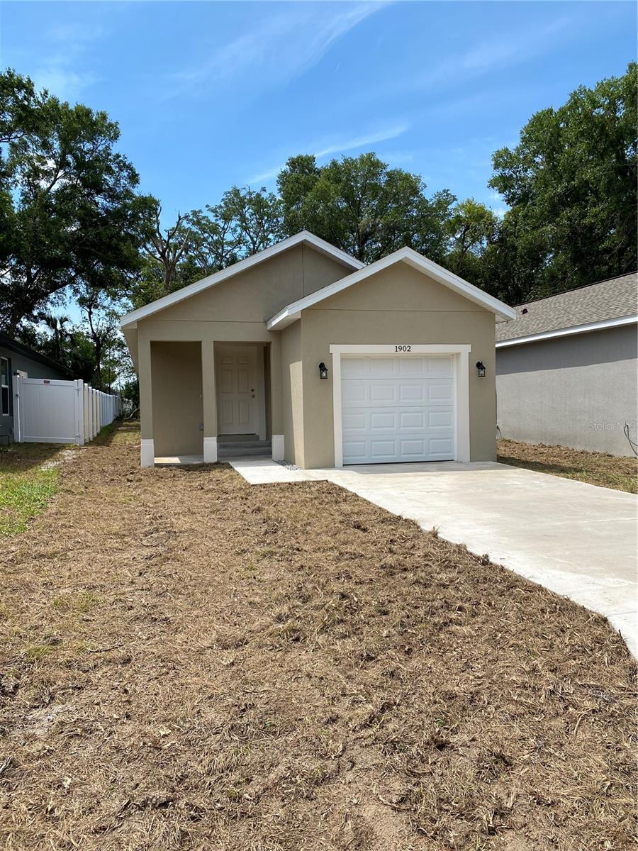 Move right in to this Brand New, 3 bed/2 bath concrete block constructed home. Open floor plan featuring vaulted ceilings in the great room; ceramic tile flooring throughout; and walk-in closets in each bedroom. Kitchen with closet pantry, granite counter tops and stainless steel appliances. Call to see today!
