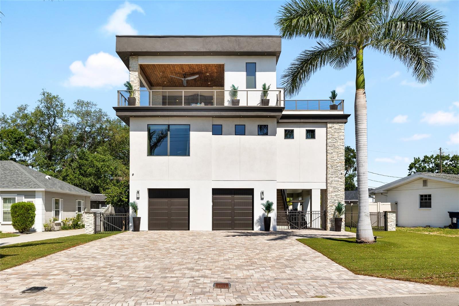 Welcome to your private sanctuary on exclusive Davis Islands—this 3,000 sq ft luxury residence offers a rare blend of elegance, comfort, and breathtaking panoramic views of the bay, the islands private airport and skyline of downtown Tampa.
Thoughtfully designed with soaring ceilings and expansive windows, this home is filled with natural light and a seamless indoor-outdoor flow. Multiple balconies throughout the home showcase captivating water and runway views, making it the perfect setting to relax, entertain, or simply watch the world take off.
Inside, you’ll find high-end finishes at every turn—from custom cabinetry and designer lighting to premium flooring and top-of-the-line appliances. The open-concept living area and gourmet kitchen are a true centerpiece, offering style and functionality for both everyday living and elevated entertaining.
Step outside to your private pool oasis, surrounded by zero maintenance landscaping and multiple lounging areas, perfect for enjoying Florida’s year-round sunshine. With elegant, modern architecture and thoughtfully curated design details, this home offers the ultimate Davis Islands lifestyle—quiet, exclusive, and effortlessly luxurious.
A few key features of this home; 5 year old Durolast roof, HVAC 1 is 1.5 years old, HVAC 2 is 3 months old, electric tankless water heater, 8+ car driveway, 4 car garage, 8* person capacity elevator, cctv security system, new exterior paint, and much more!
A rare opportunity to own a truly special home in one of Tampa’s most prestigious neighborhoods. Schedule your private showing today.