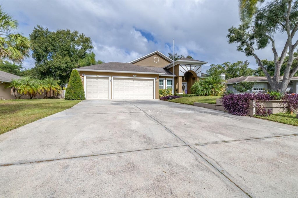 Photo of 3949 Lake Joyce Drive, Land O Lakes, FL 34639 (MLS # TB8561651)
