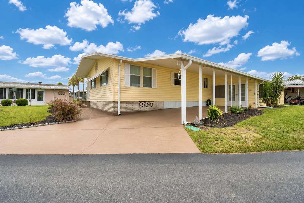 Photo of 4234 Rolling Oaks Drive, Winter Haven, FL 33880 (MLS # P4939511)