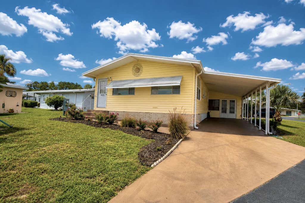 Photo of 4234 Rolling Oaks Drive, Winter Haven, FL 33880 (MLS # P4939511)