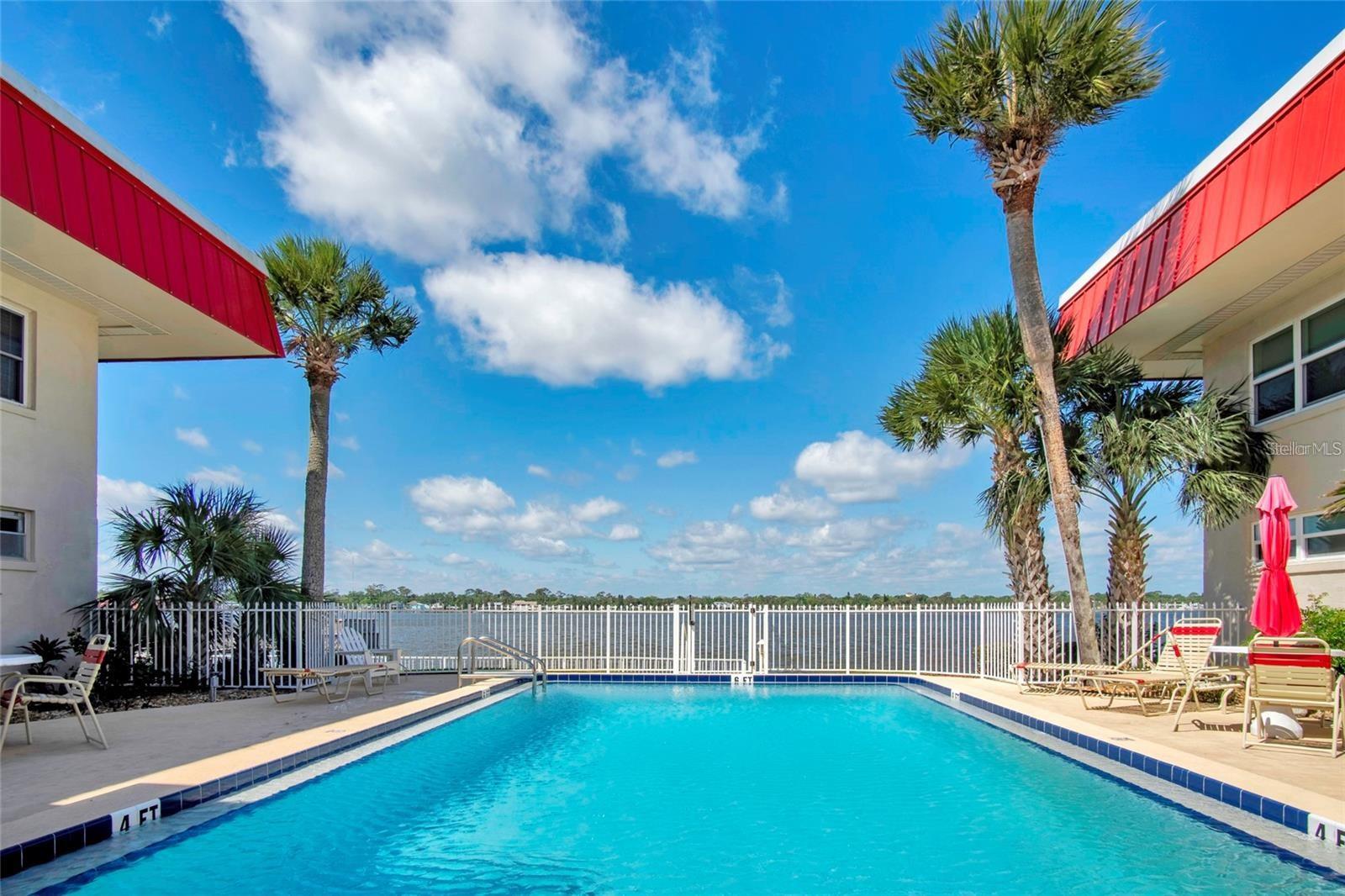 Welcome to this beautifully remodeled 2-bedroom, 2-bathroom condo in the heart of Daytona Beach! Featuring an open floor plan and a private balcony overlooking the Intracoastal Waterway and pool, this home offers the perfect blend of comfort and coastal living. Whether you’re looking for a full-time residence, vacation getaway, or an income-producing rental, this condo has it all. Situated on the Halifax River/Intracoastal Waterway, you’ll enjoy breathtaking sunsets, playful dolphins, and boats cruising by—all from your balcony or the community’s two fishing piers. Resort-style amenities include three saltwater pools (two heated), grilling stations and seating areas in each courtyard, four convenient laundry facilities, and a welcoming community room with a full kitchen, large-screen TV, seating area, and pool table. Active social groups regularly host events, making it easy to connect with neighbors. This is your chance to own a slice of paradise in sunny Daytona Beach—schedule your private showing today
