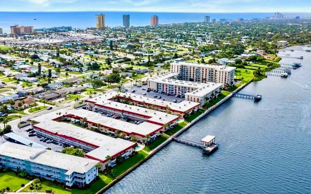 Welcome to this beautifully remodeled 2-bedroom, 2-bathroom condo in the heart of Daytona Beach! Featuring an open floor plan and a private balcony overlooking the Intracoastal Waterway and pool, this home offers the perfect blend of comfort and coastal living. Whether you’re looking for a full-time residence, vacation getaway, or an income-producing rental, this condo has it all. Situated on the Halifax River/Intracoastal Waterway, you’ll enjoy breathtaking sunsets, playful dolphins, and boats cruising by—all from your balcony or the community’s two fishing piers. Resort-style amenities include three saltwater pools (two heated), grilling stations and seating areas in each courtyard, four convenient laundry facilities, and a welcoming community room with a full kitchen, large-screen TV, seating area, and pool table. Active social groups regularly host events, making it easy to connect with neighbors. This is your chance to own a slice of paradise in sunny Daytona Beach—schedule your private showing today.