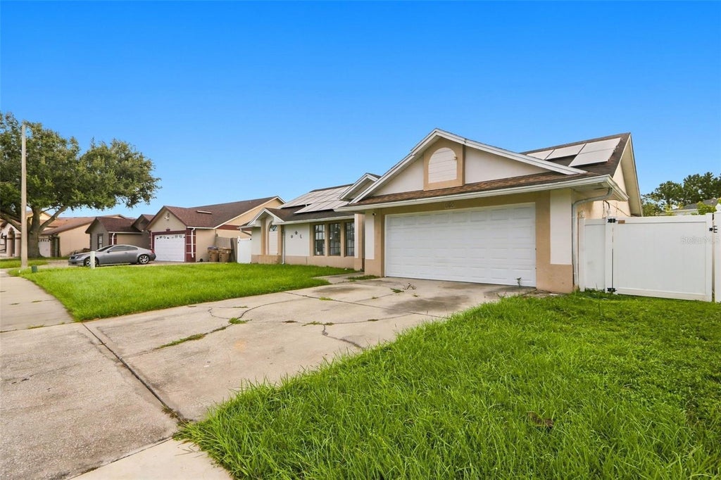 Photo of 247 Competition Drive, Kissimmee, FL 34743 (MLS # O6441348)