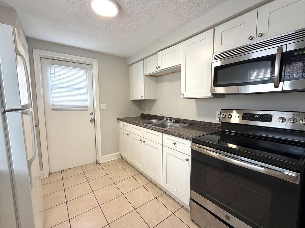 Photo of 10022 E Wilder Avenue #12, Tampa, FL 33610 (MLS # K4903456)