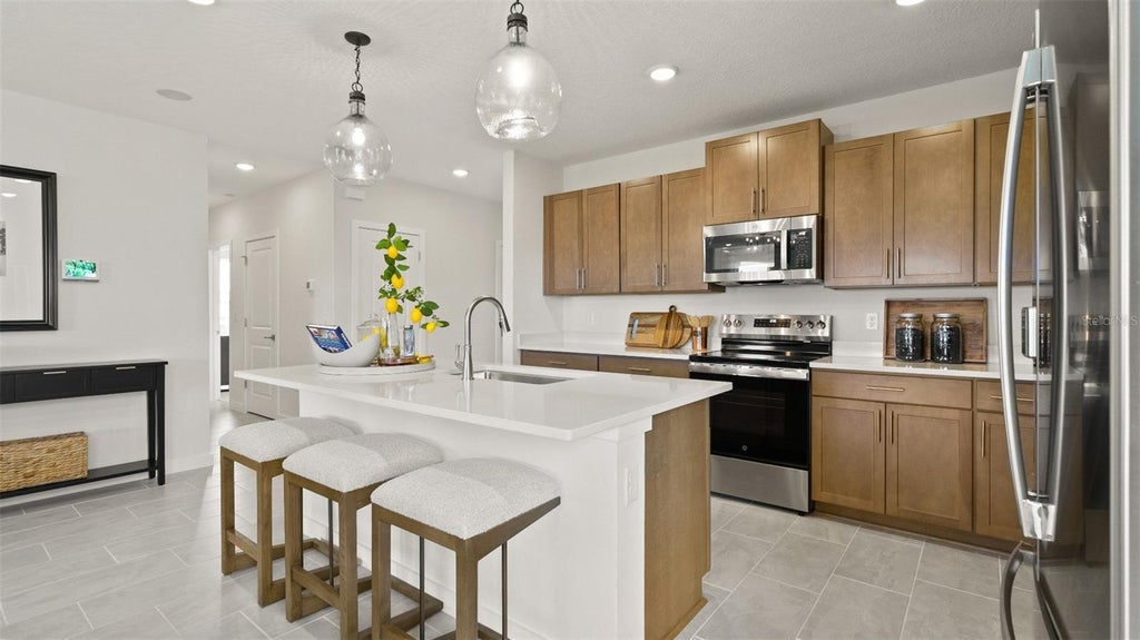 Photo of 459 Liberty Bend, Haines City, FL 33844 (MLS # O6445130)
