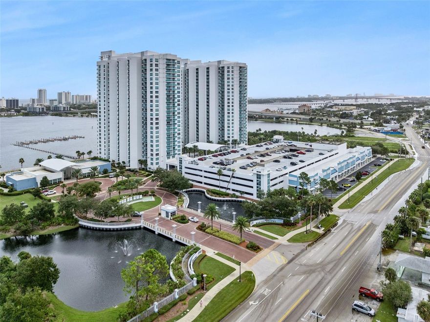 One or more photo(s) has been virtually staged. If you are looking for SPECTACULAR views of the Intracoastal Waterway in a BEAUTIFULLY Landscaped WATERFRONT and MAINTENANCE-FREE Community, you have found the PRIME location to call home. A dream come true, this MOVE-IN-READY, 2Bed/2Bath RIVERVIEW condo boasts an OPEN FLOOR PLAN, inside utility with washer/dryer, 9’ volume ceilings, spacious split-plan bedrooms, and UPGRADED TILE throughout the living areas. The bright, roomy Primary Bedroom offers sliders to the balcony overlooking the Halifax River, a walk-in closet, and a LAVISH En-suite Bath featuring a jetted tub, walk-in shower, double sinks, and Italian cabinetry with marble countertops. The state-of-the-art GOURMET KITCHEN features imported Italian cabinetry, granite countertops, double sinks, a closet pantry, and ALL GE STAINLESS APPLIANCES CONVEY. This private 18-acre GUARD-GATED community offers two clubhouses with a fitness center, yoga room, game and billiard room, theatre, library, ballroom, two pools (heated infinity and Olympic), spa, assigned covered parking, extra storage, and access to the Intracoastal Waterway. With so many amenities you may never want to leave, but when you do, opportunity awaits – you will find beaches, theme parks, golfing, fishing, and a plethora of shopping and restaurants to seek out. You can unwind at the end of a busy day on your large covered BALCONY, where you can read, entertain, or just relax and enjoy your awesome view of the Halifax River and infinity pool. Live where EXCELLENCE resides –Marina Grande on the Halifax affords the lifestyle you deserve! This property may be under audio & visual surveillance.