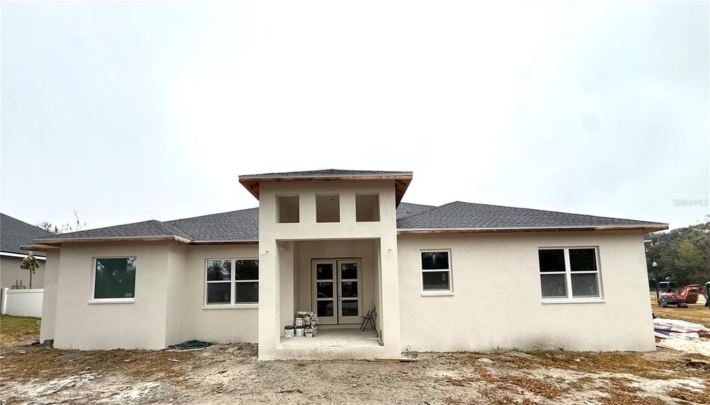 Photo of 589 Christina Lake Drive, Lakeland, FL 33813 (MLS # TB8432752)