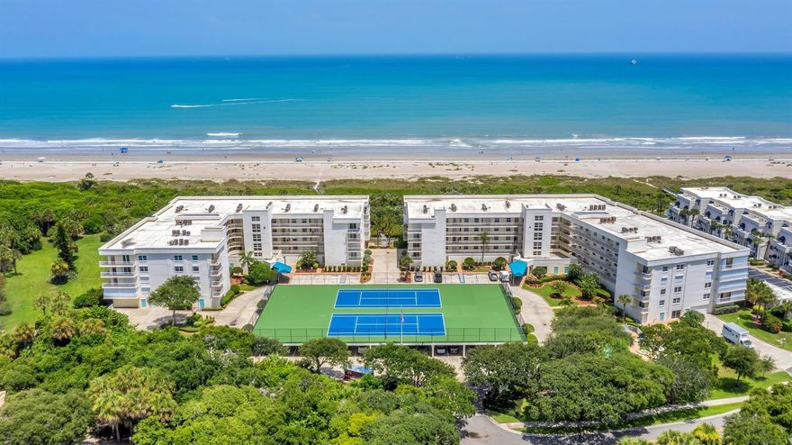 Fully furnished direct oceanfront. Do you need a place to cool down, wind down and enjoy the best that Florida has to offer? This is your chance to own a beautiful oceanfront condominium on the white sand beaches of Cocoa Beach. Located on the north end of Cocoa Beach, this two-bedroom, two-bath home is on the third floor, offering panoramic ocean views from almost every room. The current owner has renovated the unit and has meticulously maintained the home. An updated kitchen, with stainless steel GE Profile appliances, a walk-in pantry, custom wood cabinets with soft-close drawers, and a dining area, overlooks the great room. The spacious primary suite features a sliding glass door with direct access to the expansive covered patio, two separate closets, and a spa-like bath with a jetted tub, a separate shower with multi-shower heads and a pan shower. A secondary bedroom with two closets and direct access to the second bath completes the home. Extras include, but are not limited to, hardwood floors, plantations shutters throughout, a large inside utility room, a covered patio that spans the width of the entire unit, a private one-car garage within the enclosed first-floor secured garage - great for all your beach extras such as surfboards, beach bikes, fishing gear, etc. This home comes fully furnished with high-end furniture, a corner sleeper sofa, a dining set, all kitchen tableware and utensils, all artwork, all linens and all beach equipment in the private garage. The complex is very well maintained and offers wonderful amenities such as a newly refinished tennis court/pickleball court, a fitness room with a sauna, a community pool, gorgeous grounds and a private boardwalk to the beach. Enjoy breathtaking sunrises, watch the cruise ships sail by, and have a “front row” seat for rocket launches! ;LocationDescription: Condo