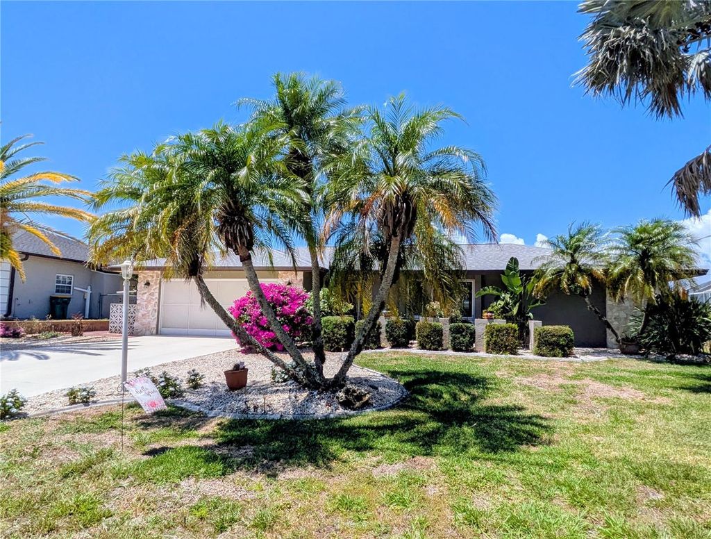 Photo of 322 E Tarpon Boulevard NW, Port Charlotte, FL 33952 (MLS # C7525322)