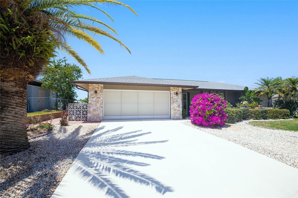 Photo of 322 E Tarpon Boulevard NW, Port Charlotte, FL 33952 (MLS # C7525322)