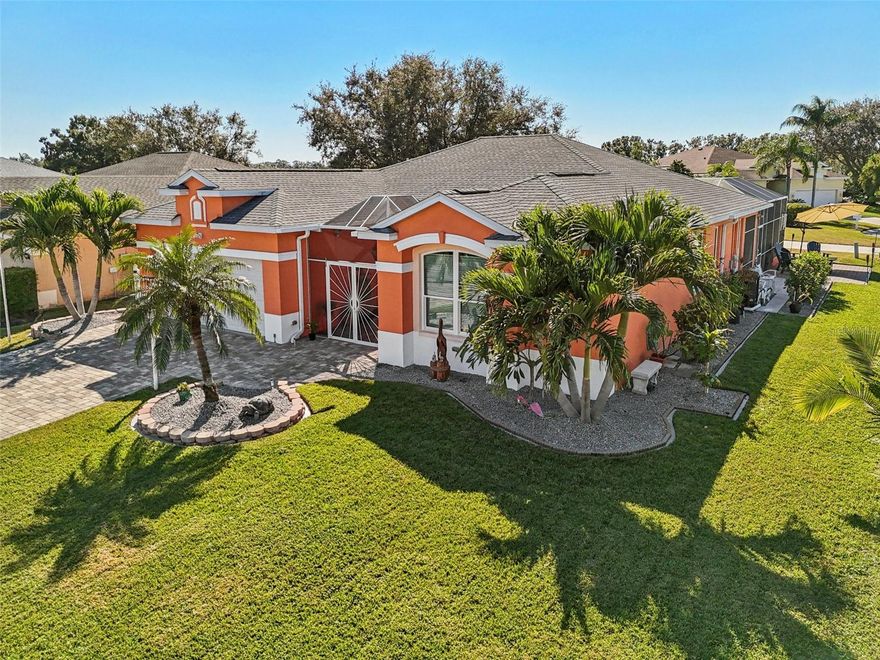 Welcome to your slice of Florida paradise where everyday living meets resort-style luxury.  This meticulously maintained three-bedroom, two-bathroom home offers a thoughtfully designed interior with a bright open split floor plan surrounding the kitchen, where your culinary adventures await ... with double ovens, an abundance of 42" soft close cabinets, granite countertops that gleam with under-cabinet lighting, a breakfast bar, plus plenty of room to add a coffee bar or breakfast nook up front ...while still maintaining the clean lines that make this space both functional and beautiful.  What truly sets this property apart – THE OUTDOOR OASIS awaits just beyond your back door!  The private heated swimming pool and spa create your personal retreat, complete with soothing waterfalls that provide the perfect soundtrack for relaxation. Whether you're starting your day with morning laps, cooling off during the afternoon heat, or unwinding under the stars, this aquatic paradise transforms your backyard into a year-round vacation destination.  The new owner will reap the huge benefits that were invested in this "forever home" by its current owner who spared no expense with hurricane impact windows and bullet proof doors,  hurricane garage door, 2025 thermostatic attic fan, 28 solar panels to take the worry out of electric bills, 2019 roof, 2025 HVAC with a 10 year transferrable warranty for parts and labor,  "Florida Glass" added around screened pool lanai for extra privacy, 2021 water heater, irrigation system filter, home was repiped in 2004, attic has wood floor covering for extra storage. The paver driveway and side patio add sophisticated hardscaping elements that complement the home's overall aesthetic while providing durable, low-maintenance surfaces that stand up to Florida's unique climate challenges.  The pavers continue into the gated front screened courtyard.  This home represents the perfect balance between private sanctuary and convenient location, with short distances to Publix Super Market, The Legacy Trail, Detwiler's Farm Market, downtown Gulf Gate and Sarasota, ....and of the course the world famous Siesta Key Beach!!!  You really don't want to miss this opportunity.