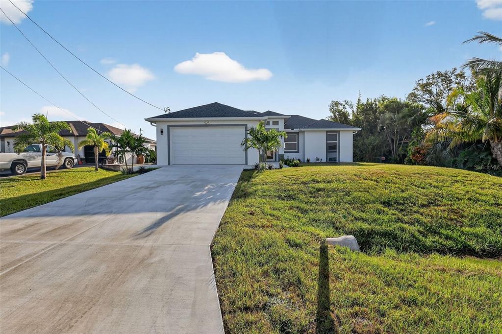 Photo of 523 NW 26th Place, Cape Coral, FL 33993 (MLS # O6348582)