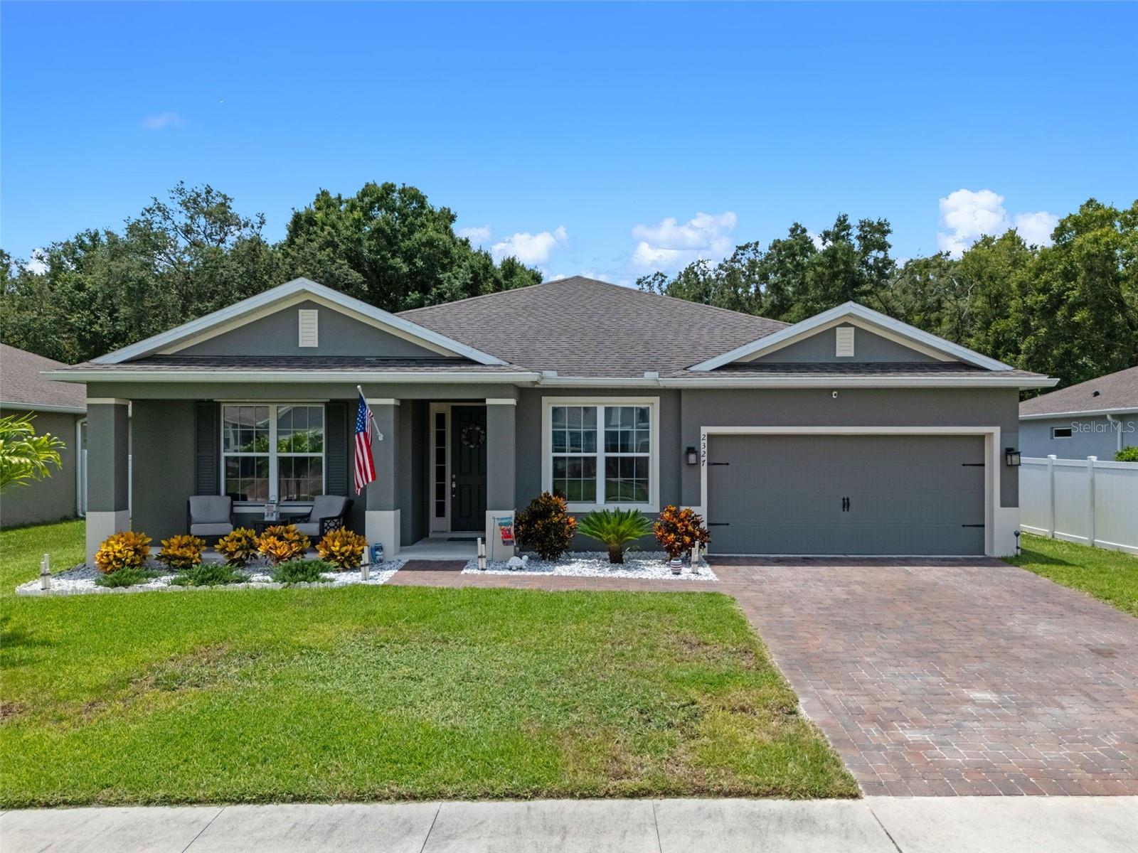 2327 Palmetum Loop, Apopka, FL – The Seaside Model in Orchid Estates
Welcome to 2327 Palmetum Loop in Apopka’s desirable Orchid Estates, a quiet, well-kept community with only 112 homesites, located within the Orange County School District. This spacious Seaside model by Ryan Homes was completed in March 2020 and offers 4 bedrooms, 3 full bathrooms, a flex room, and a formal dining area across 2,539 square feet of single-story living space.
This home features an open-concept layout that’s perfect for both everyday living and entertaining. The main living areas are finished in durable tile, and the gourmet kitchen brings it all together with 42" cabinets, granite countertops, a stylish backsplash, stainless steel appliances, a double oven, and gas range hookup. The kitchen flows effortlessly into the living and dining areas, giving you the flexibility to host large gatherings or enjoy quiet nights at home.
The owner’s suite is generously sized and features a large walk-in shower, dual vanities, and a spacious walk-in closet. One of the secondary bedrooms includes its own ensuite bath, creating a perfect space for guests or multigenerational living.
At the front of the home, a flex room offers space for a home office, 5th bedroom, or even a cozy crochet room—The formal dining area adds even more flexibility and functionality depending on your lifestyle.
Step outside to a screened-in lanai overlooking a private conservation area with no rear neighbors—a peaceful backdrop for morning coffee or evening get-togethers. The backyard is spacious and ready for your dream pool or outdoor oasis. The home also comes equipped with smart features like WiFi-enabled garage openers and thermostats, along with a RainSoft water treatment system installed in the garage for added convenience and water quality.
Orchid Estates is the perfect blend of comfort and convenience, but what truly sets it apart is the location and growth potential. This neighborhood is zoned for Kelly Park K-8 School and located near some of Apopka’s best attractions like Rock Springs Park, the Field of Fame sports complex, and the 180-acre Jason Dwelley Recreation Complex, which includes sports facilities, walking trails, and a 1,500-seat amphitheater.
You’re just minutes from everyday essentials like Publix and the highly anticipated Wyld Oaks mixed-use development, which will bring new shopping, dining, and entertainment to the growing Kelly Park corridor. With easy access to SR 441, 429, the Turnpike, Wekiva Parkway, I-4, Downtown Orlando, and nearby cities like Winter Garden, Winter Park, Altamonte Springs, and Longwood, you're also just 30 minutes from Disney and the area's top attractions.
If you’ve been looking for a home that checks every box—with smart design, room to grow, and a location that only gets better over time—2327 Palmetum Loop is it.
