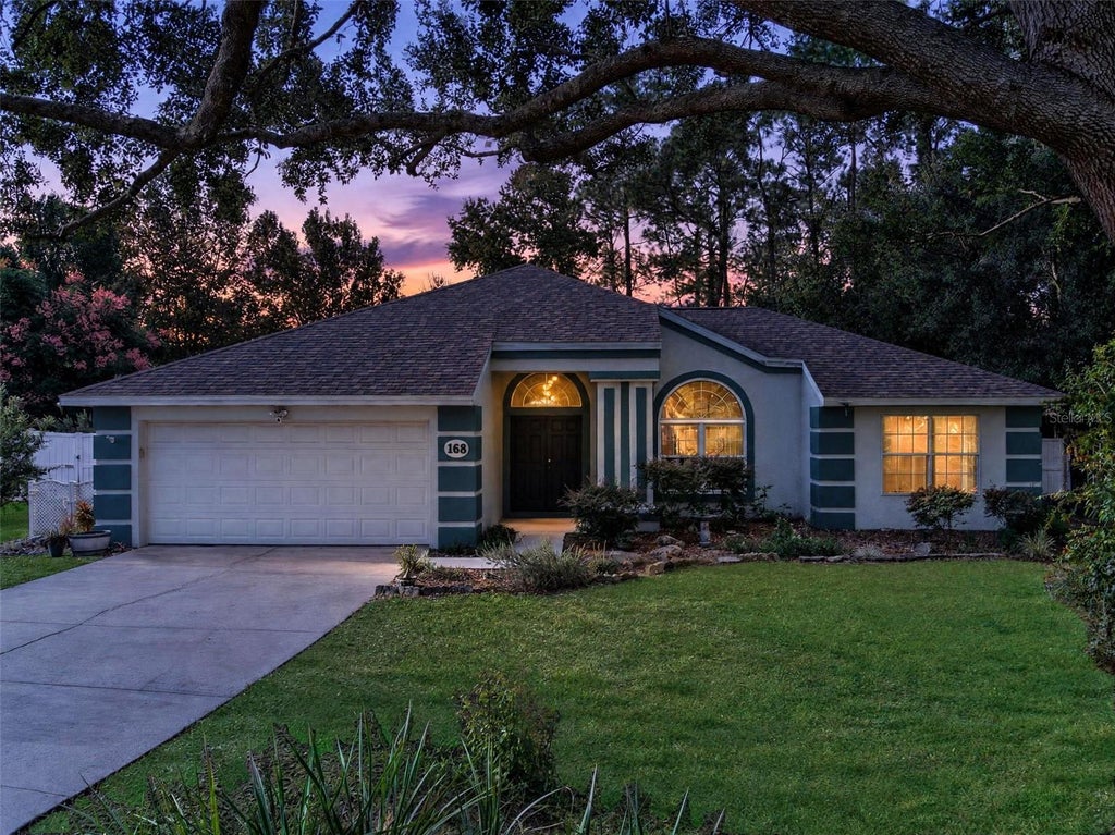 Photo of 168 Pine Lake View Drive, Davenport, FL 33837 (MLS # O6450591)