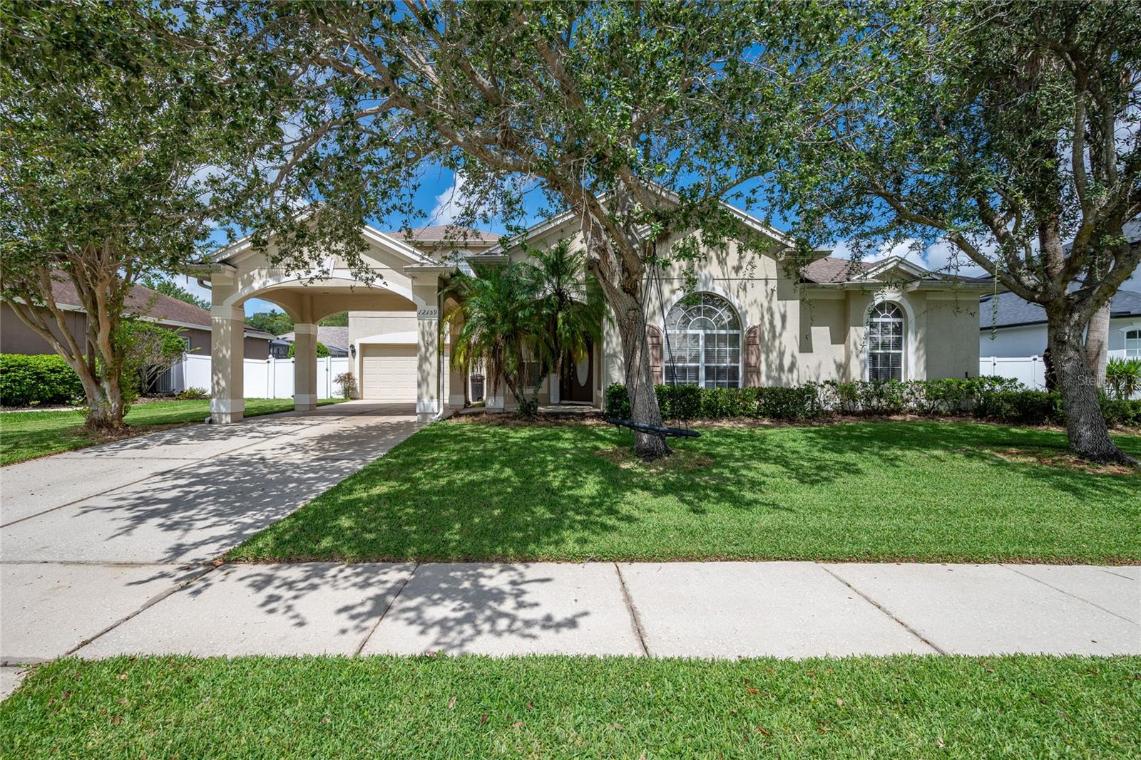 Spectacular and Huge Pool Home Located at GATED community of SABAL ISLES in Waterford Chase in East Orlando. This Beautiful Home Is Offering 4 Huge Bedrooms and 3 Large Bathrooms. Master Suite with private door to the lanai, walk-in closet and private bath, walk-in glass shower, tub and double vanity sinks. 4th BR has French Doors, could be Study/Office and Huge Upstairs Bonus Room! You'll love the comfort this home provides with high, vaulted ceilings, a formal Living and Dining area, as well as Featuring an OPEN-CONCEPT Kitchen and Family Room combination. The beautiful kitchen features 42" cabinets, granite countertops, a center island and Breakfast Bar. Step through the sliding glass doors from the Kitchen to the covered Beautiful Pool & Spa - screened in for extra comfort and Big Covered Lanai. The community has Basketball courts, Volleyball courts, Tennis courts & Playground. Top rated Schools. Conveniently & centrally located near Waterford Lakes Shopping/Dining, UCF, Lockheed, Siemens and Major Highways.