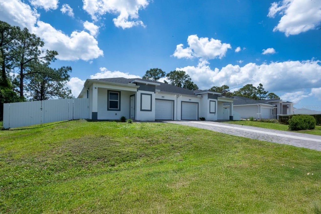 Photo of 4533 SW 22nd St #2, Lehigh Acres, FL 33973 (MLS # S5158287)