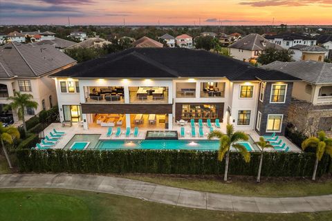 Photo of 350 Muirfield Loop, Reunion, FL 34747 (MLS # O6368817)