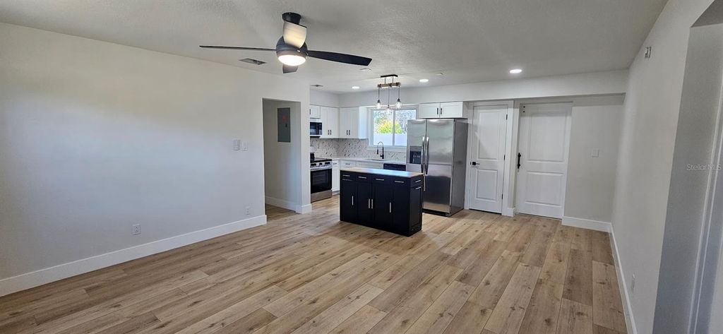 Photo of 410 S Oxalis Avenue, Orlando, FL 32807 (MLS # O6377810)