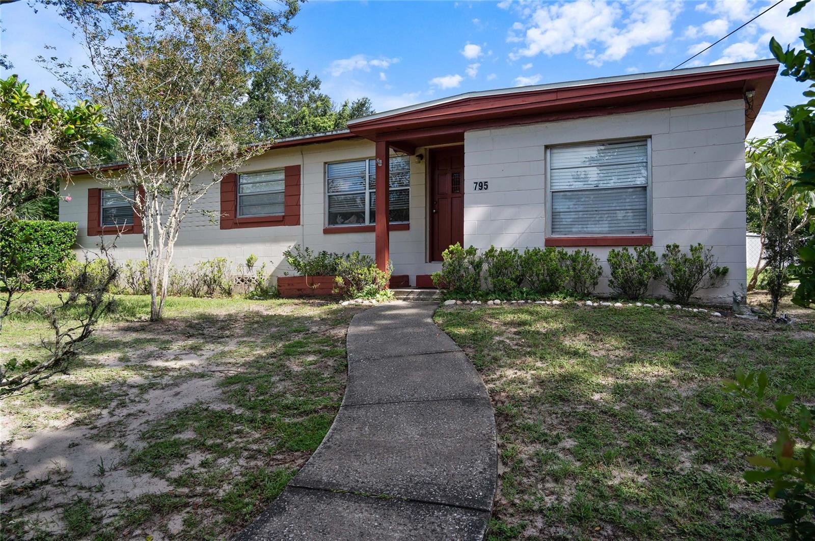 >>>IMAGINE YOUR NAME ON THE MAILBOX<<< Home ownership is realistic with this dynamic price and location. Live the Florida lifestyle with your amazing pool and patio area on this huge corner lot. Sitting up on a hill, this terrific 3 bedroom & 1 bath home offers all the essentials you need. Flex space as you enter, currently a dining area, flows into a nice sized kitchen with wood cabinets. Off the current dining is a large Family Room. Down the hallway is 3 bedrooms and the bathroom, plus 2 storage closets. All bedrooms have closet spaces and laminate flooring throughout. Nice dinette area in kitchen, with pool views, that leads through the sliding glass doors onto a screened-in patio with lots of seating area. This space also is the laundry and has a storage closet. The backyard boasts a huge deep pool and decking. Imagine coming home to this every day and spending time with your family hosting pool parties! Lots of room to roam in the yard, with over .39 acres here…also 2 sheds and a covered parking area or boat/rv storage. Quiet street in established neighborhood. Currently zoned for Lake Brantley High. Close to all major highways, new shopping plazas and lots of dining choices. Priced Right, Right Location! Don’t wait come this Florida gem today!