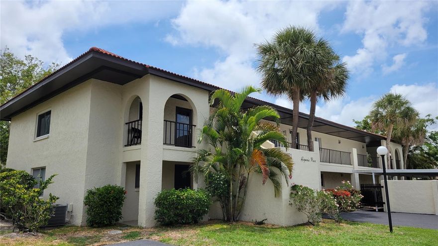 BACK ON THE MARKET  This annual unfurnished condo is spacious, and a natural sunlight filled corner unit on the ground floor in peaceful 55+ community. The flooring is all solid surface, either wood or tile, throughout. This two bedroom, one bathroom unit is well constructed, with large glassed in lanai. The kitchen has solid wooden cabinets and pass thru to dining area. The living room, and dining room are open planned. The master bedroom has a walk in closet. New wood flooring just installed. The community laundry is close by, as well as storage closet and your carport just outside the front door. Amenity package included a large clubhouse, with meeting rooms and fitness center with sauna, billiard room, large heated pool, BBQ grill area with outdoor dining options and shuffleboard. This community is close to shopping and dining, art venues, the beach, museums, the library and the opera. Call today for your next home!