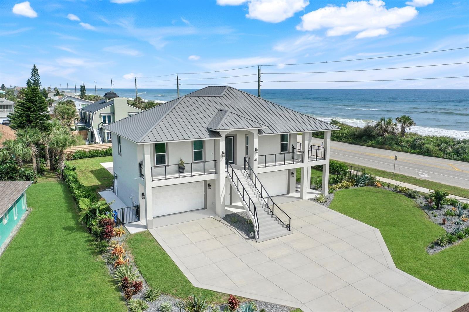Under contract-accepting backup offers. Live life to the fullest in your oceanfront paradise where every day feels like a vacation. Imagine waking up to the soothing sounds of the Atlantic Ocean just steps from your door. Seabridge offers more than just a home, it’s a lifestyle of relaxation and elegance. Enjoy stunning views, covered balconies, and an expansive stone sun deck surrounding a heated saltwater pool. Inside, high-quality finishes, a top-of-the-line kitchen, and an elevator add luxury and convenience, while hurricane-rated features and security systems offer peace of mind. Welcome to your dream beachside retreat where every day feels like a serene escape.