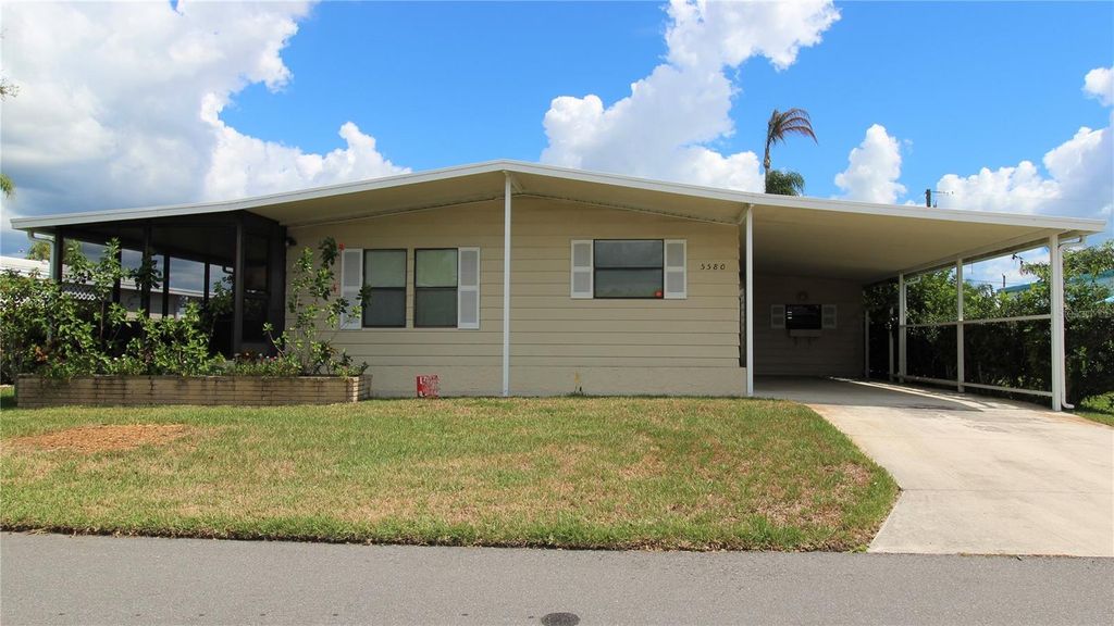 Photo of 5580 Stonehaven Lane, Sarasota, FL 34233 (MLS # A4681423)