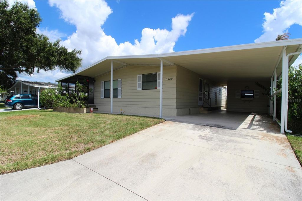 Photo of 5580 Stonehaven Lane, Sarasota, FL 34233 (MLS # A4681423)