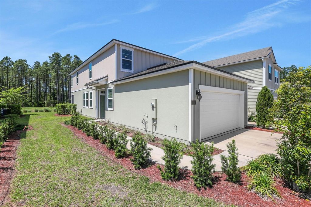 Photo of 50 Redbud Road, Palm Coast, FL 32137 (MLS # FC317871)