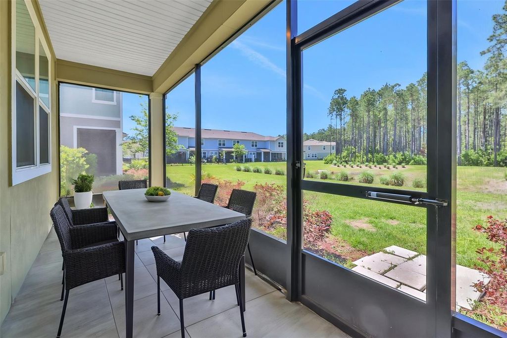 Photo of 50 Redbud Road, Palm Coast, FL 32137 (MLS # FC317871)