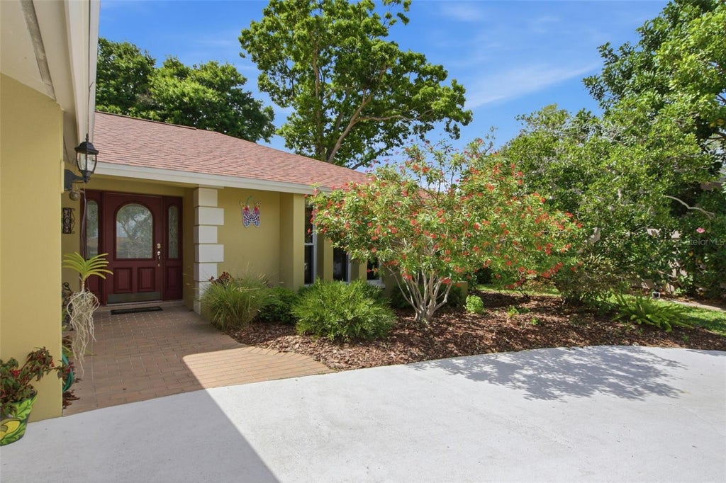 Photo of 709 Grovewood Lane, Largo, FL 33770 (MLS # TB8516931)