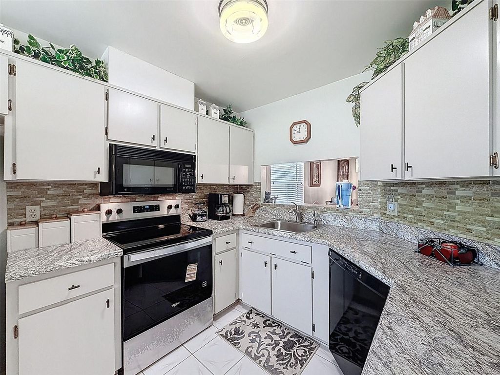 Photo of 11704 Aspenwood Drive, New Port Richey, FL 34654 (MLS # W7884693)