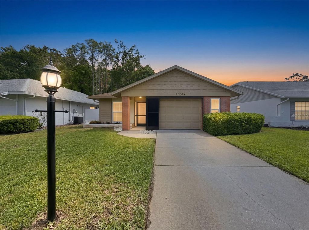 Photo of 11704 Aspenwood Drive, New Port Richey, FL 34654 (MLS # W7884693)