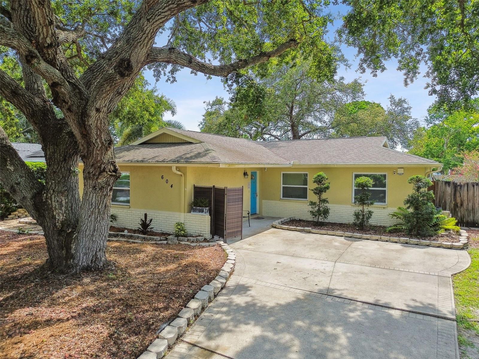 Welcome to this unique and versatile single-family home with no HOA or CDD fees, located in the heart of Oldsmar, Florida. This home features a total of 3 bedrooms and 3 full bathrooms, all recently remodeled with modern finishes. The kitchen boasts granite countertops and solid wood cabinets, along with newer windows, while the updated bathrooms and living areas provide both comfort and style. This property offers an exclusive layout with three master bedrooms connected living spaces, two of which can be a guest suite with an independent entrance, one it’s converted from the garage, making it perfect for extended family, guests, or rental potential. Step outside to a cozy covered porch that is ideal for relaxing in the shade. The property has not any damage from recent hurricanes, offering peace of mind. Surrounded by mature vegetation and located steps away from a walking path /fitness trail from a city park, ideal for families or active people, it is also located in an excellent school district, this home combines charm, flexibility, and a prime location. Enjoy easy access to stunning Gulf beaches at close as only 10 miles away like Clearwater Beach, Caladesi Island State Park, Honeymoon Island State Park, Sand Key Park, Indian Rocks Beach, and Madeira Beach, as well as Oldsmar natural parks and entertainment options. The home is also within striking distance of the mall, airport, amazing restaurants, and all shopping centers. Close to main avenue but you can enjoy a peaceful home away from traffic or city noise.