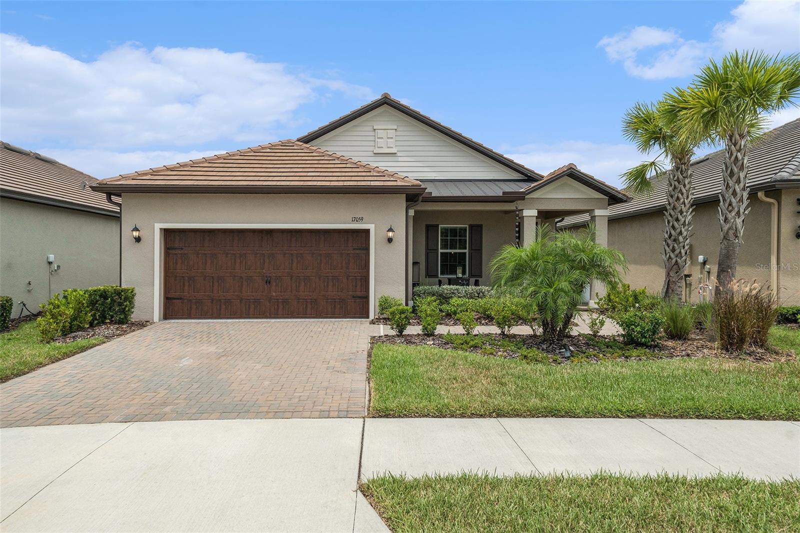 Don't miss out on this spectacular Splendor model, offering 1,783 sq. ft. of thoughtfully designed living space. Built less than 3 years ago and " a short walk to the Clubhouse"! It features 2 bedrooms, 2 baths, and sits on a" premium lot" overlooking a serene pond. The open-concept floor plan flows seamlessly between the kitchen, dining, and living areas—perfect for everyday living and entertaining. The owner’s suite boasts a large walk-in closet and a luxurious ensuite bath, creating a comfortable private retreat. This home is better than new and completely move-in ready. Upgrades include crown molding, screened lanai with pavers, and epoxy flooring in the garage.
Life at Medley means access to exclusive 55+ amenities, including a resort-style clubhouse, state-of-the-art fitness center, six pickleball courts, bocce ball, shuffleboard, a gorgeous pool, and a café. There is also a full calendar of events and entertainment that comes out monthly so you have many options to be as involved as you like.
Angeline is a 6,200-acre master-planned community designed to connect residents with wellness, nature, and innovation. Highlights include a working farm with fresh produce, live entertainment, café, and future Lagoon.
The 775-acre Moffitt Cancer Center campus currently underway (set to be larger than downtown Tampa), and plans for 100 miles of scenic trails and a sprawling community park.
This home offers not only comfort and style, but also the opportunity to be part of one of the most exciting and forward-thinking communities in Florida.