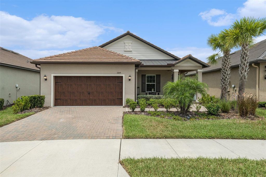 Photo of 17059 Shell Bay Drive, Land O Lakes, FL 34638 (MLS # TB8418811)