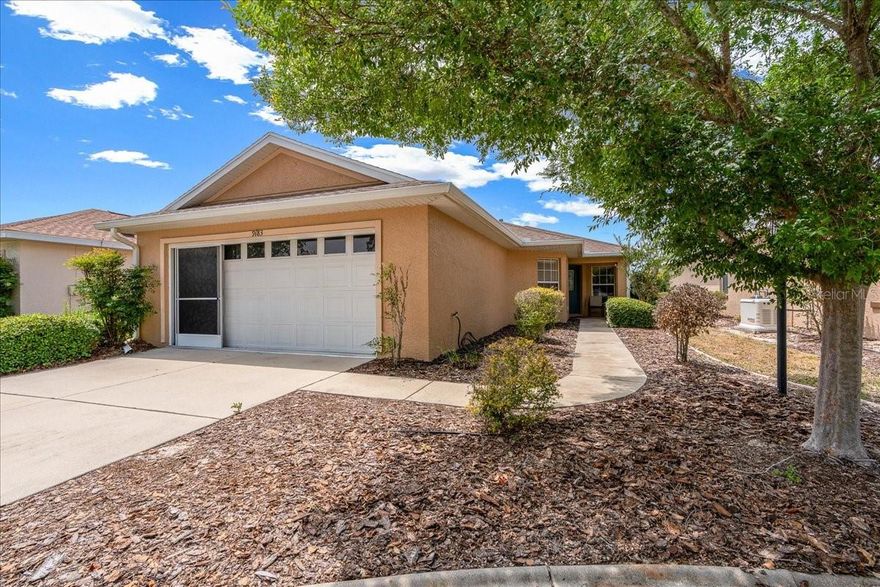 Welcome to easy, resort-style living in this highly sought-after Sheffield model—perfectly designed for today’s 55+ lifestyle. This thoughtfully laid-out home offers 2 bedrooms with a split-bedroom plan for privacy, 2 baths, a versatile flex room, and a 2-car garage—all priced to sell. Tucked away on a quiet circle (no thru traffic), you’ll enjoy a peaceful setting just minutes from top community amenities, including The Arbors and the brand-new Summit pool and recreation center—ideal for staying active and social. HVAC 2024. Inside, you’ll find beautiful engineered hardwood floors and an open-concept kitchen and great room that creates a bright, welcoming space for everyday living and entertaining. The kitchen features granite countertops, wood cabinetry, stainless steel appliances, and generous workspace—perfect for hosting friends and family. The private guest suite is thoughtfully positioned off the main living area, offering comfort and separation for visiting family or friends. A spacious flex room provides the flexibility you need—whether for a home office, hobby space, or craft room. Unwind in the primary suite, quietly located at the back of the home, complete with dual closets (including a walk-in) and an en suite bath featuring a step-in shower and comfort-height toilet for ease and convenience. Step out from the great room through the slider w/plantation shutters to the large, screened lanai, with solar shades—an ideal spot to enjoy Florida’s beautiful weather year-round without the upkeep. If you’re looking for a low-maintenance home in a vibrant, amenity-rich 55+ community, this one checks all the boxes—and at a price that makes it an exceptional value. The monthly HOA fee includes Basic Spectrum Cable, roof repair, exterior painting every seven years, exterior maintenance and insurance, landscaping, trash & recycling, 24/7 monitored gates and what seems like endless amenities; four pools (3 outside (1 is BRAND NEW1) & 1 inside), two state of the art fitness centers, pickleball (uncovered & covered), billiards, archery range, corn hole, bocce ball, tennis, shuffleboard, horse shoes, remote control flying field and race cars, 175+ clubs, woodworking shop (extra fee), library, and much, much more! A golf cart community with access to several shopping centers. Centrally located 20 minutes from the World Equestrian Center, easy drive to 4 cruise ports and/or airports, and within a close proximity to entertainment complexes in Orlando.