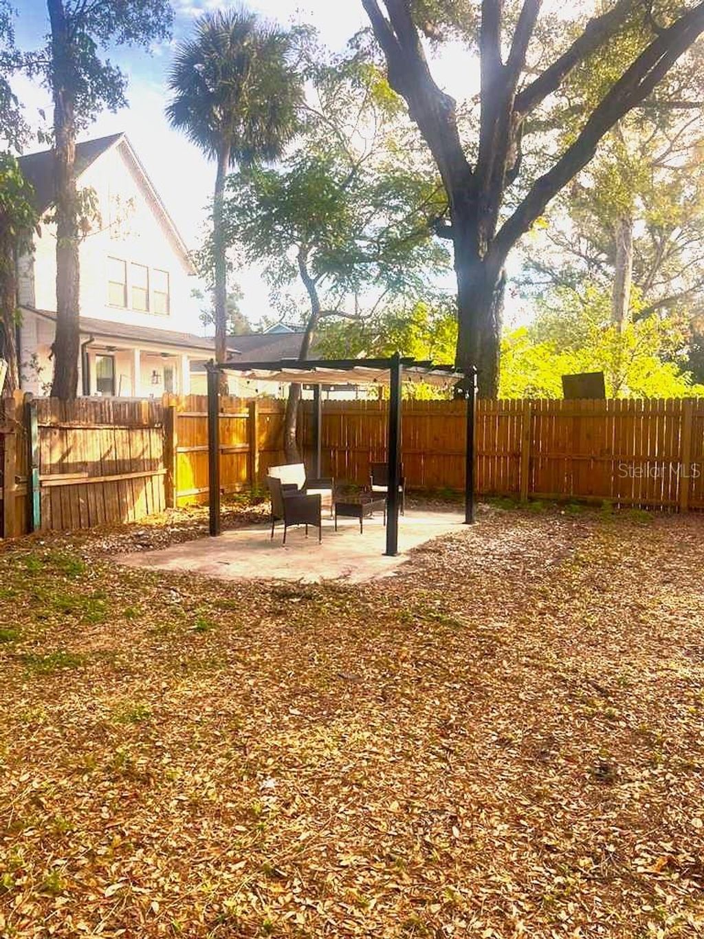 Photo of 402 E Virginia Avenue, Tampa, FL 33603 (MLS # TB8450783)