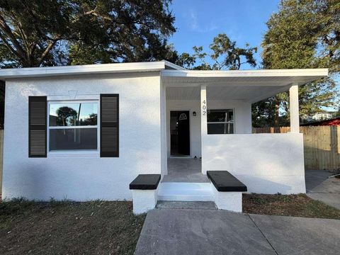 Photo of 402 E Virginia Avenue, Tampa, FL 33603 (MLS # TB8450783)