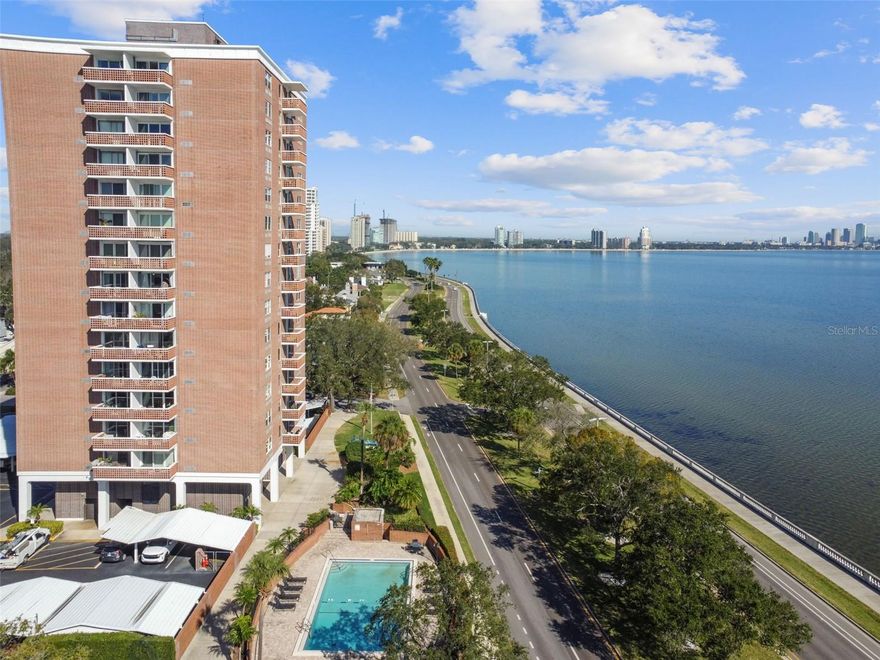 Beautifully updated 1 bed/1 bath condo, located on exclusive Bayshore Boulevard.  Experience the best South Tampa has to offer in one of the most desirable neighborhoods with A rated schools (Roosevelt/Coleman/Plant), restaurants, shops and city parks within walking distance. This move in ready condo features central AC, updated bathroom and kitchen with hardwood cabinetry and granite counters, custom pantry closet, LVP floors throughout and impact resistant windows and sliding door.  Enjoy breathtaking views of the sunset and the bay from your private balcony, and take advantage of the 5-mile linear park that is Bayshore Boulevard. Other amenities include waterfront pool, assigned covered parking, a storage unit, fully furnished guest suite with kitchenette that can be reserved for visitors, on site management and maintenance staff, and guest parking. The building has a new roof installed in 2025, is located in food zone X and passed the mandatory Milestone Inspection with no structural deficiencies found. The association is currently in the process of updating the lobby, hallways and common areas with new carpet, paint and all new furnishings. Don’t miss this opportunity to live on Bayshore Boulevard, the most desirable location in Tampa, in a move in ready condo at an excellent price point for the area.